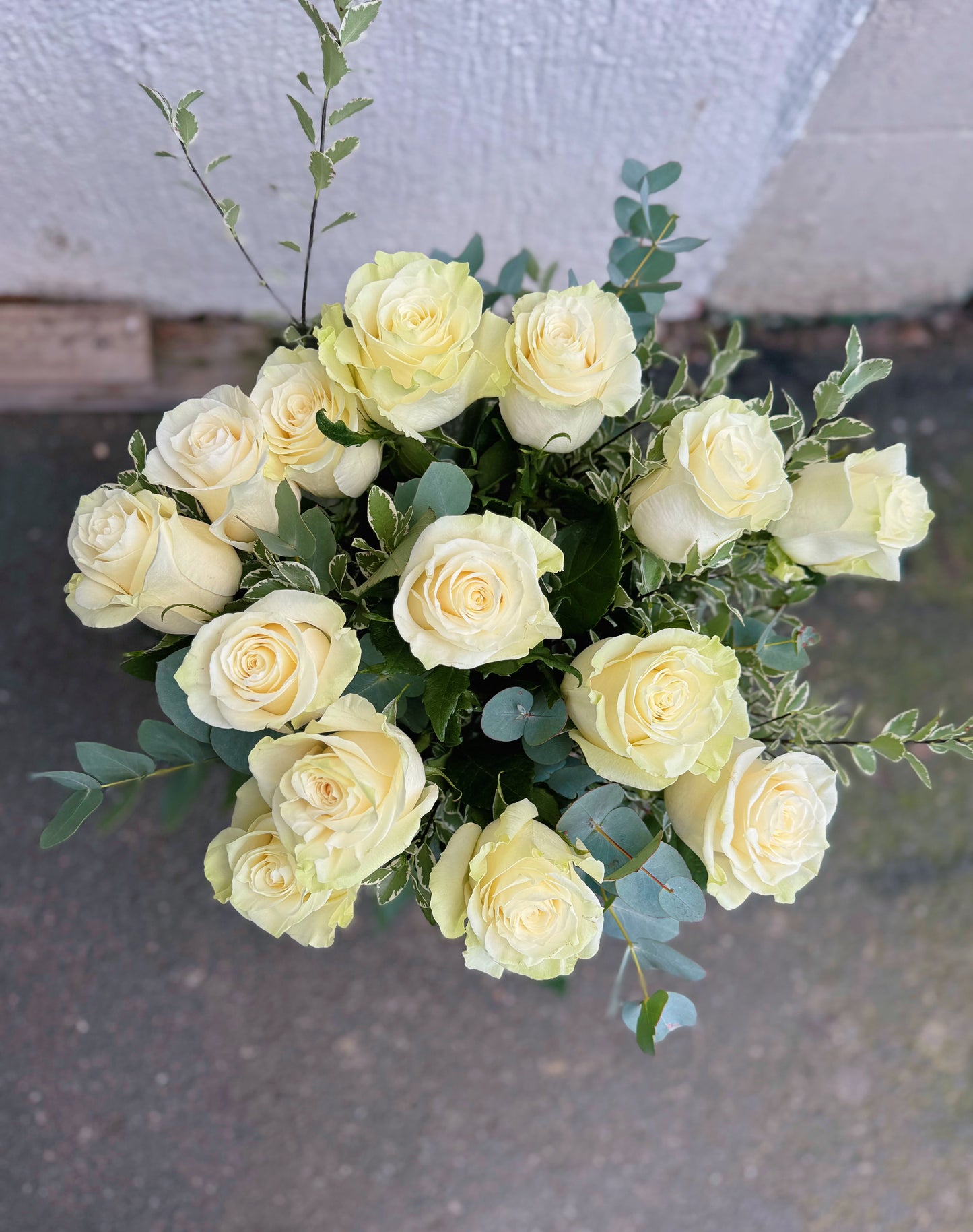 White Roses in Glass Vase