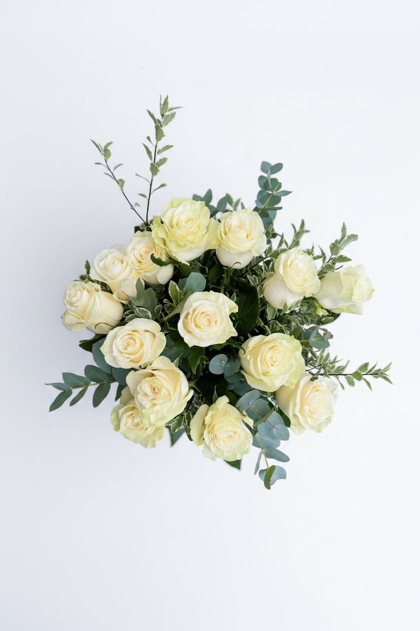 White Roses in Glass Vase