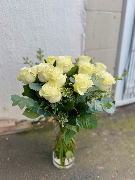 White Roses in Glass Vase