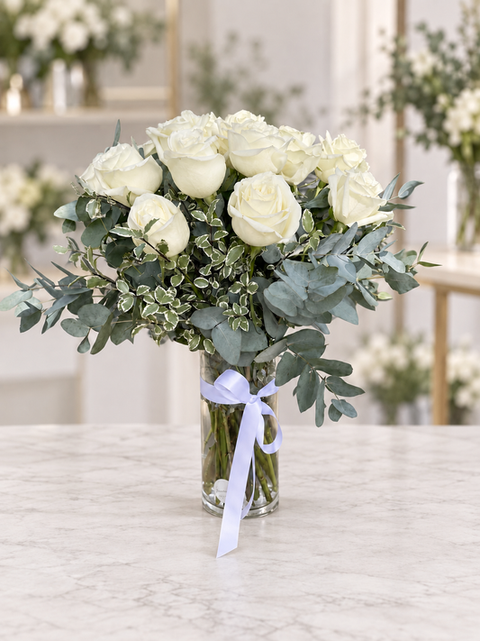White Roses in Glass Vase